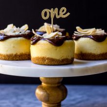 Vanilla Bean Cheesecakes with Toasted Coconut Crust Topped with Chocolate Ganache