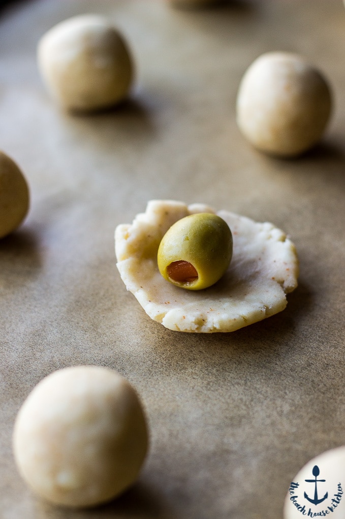 Pastry dough with an olive on top