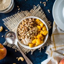 Farro Breakfast Bowl with Caramelized Peaches and Cashew Cream