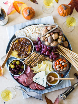 Holiday Cheeseboard with Bacon Onion Jam with Glazed Pecans Baked Brie