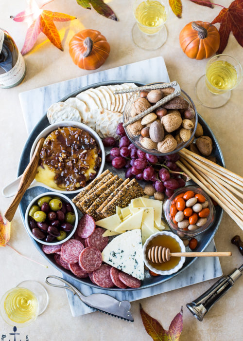 Holiday Cheeseboard with Bacon Onion Jam with Glazed Pecans Baked Brie