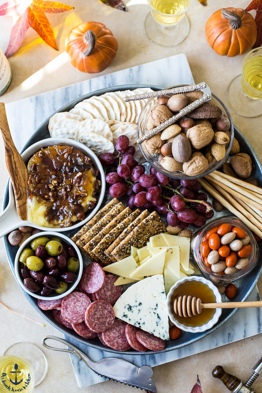 Holiday Cheese Board with Baked Brie with Bacon Onion Jam and Glazed Pecans