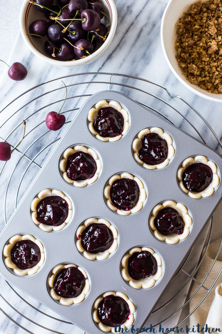 Overhead photo of cherry pie bites in mini muffin tray