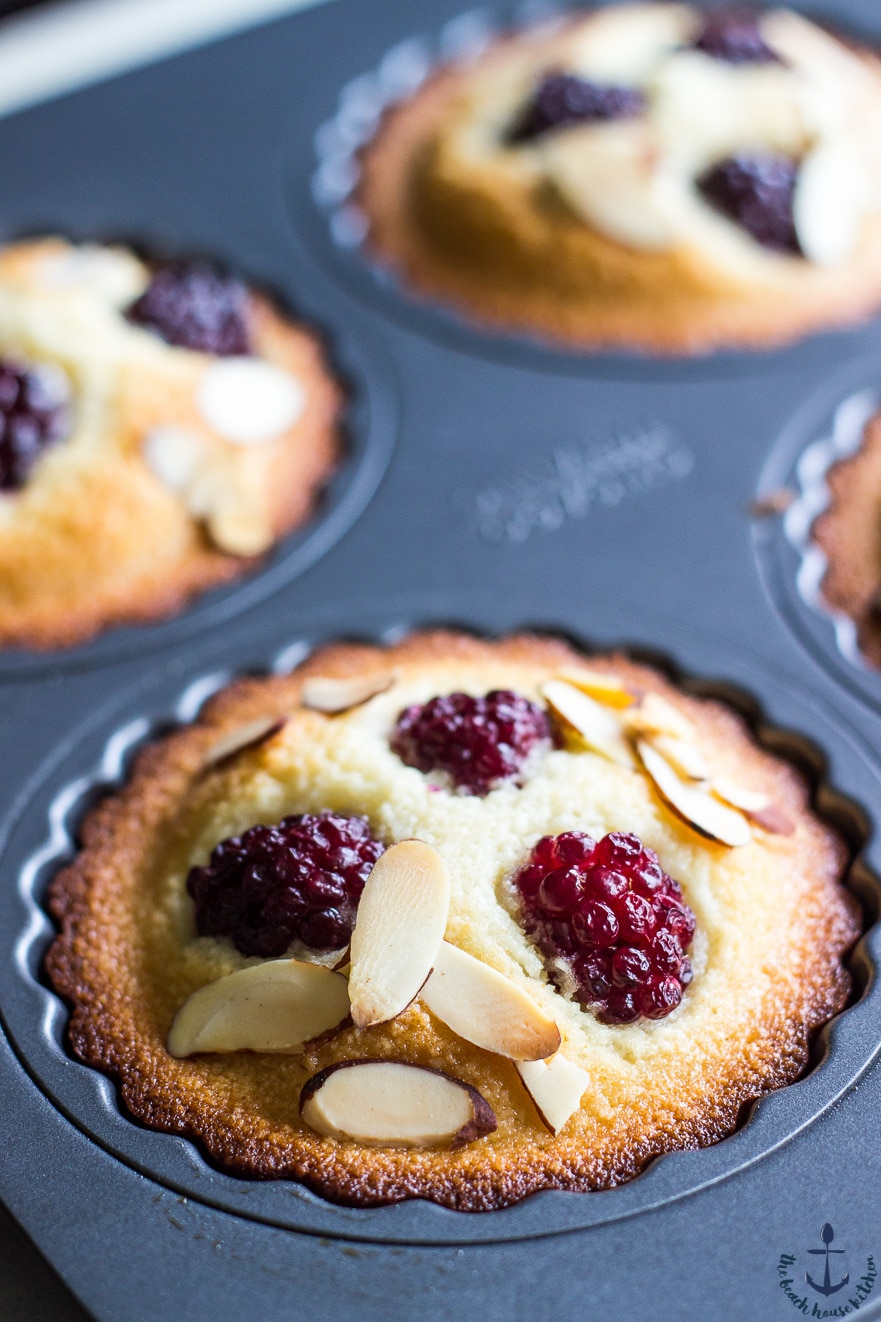 Almond Blackberry Financiers in a tart pan