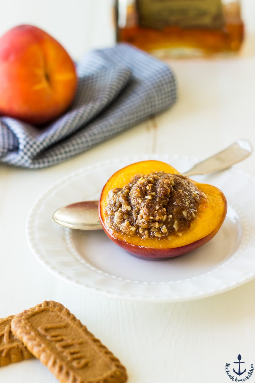 A peach stuffed with almonds and biscoff cookie filling