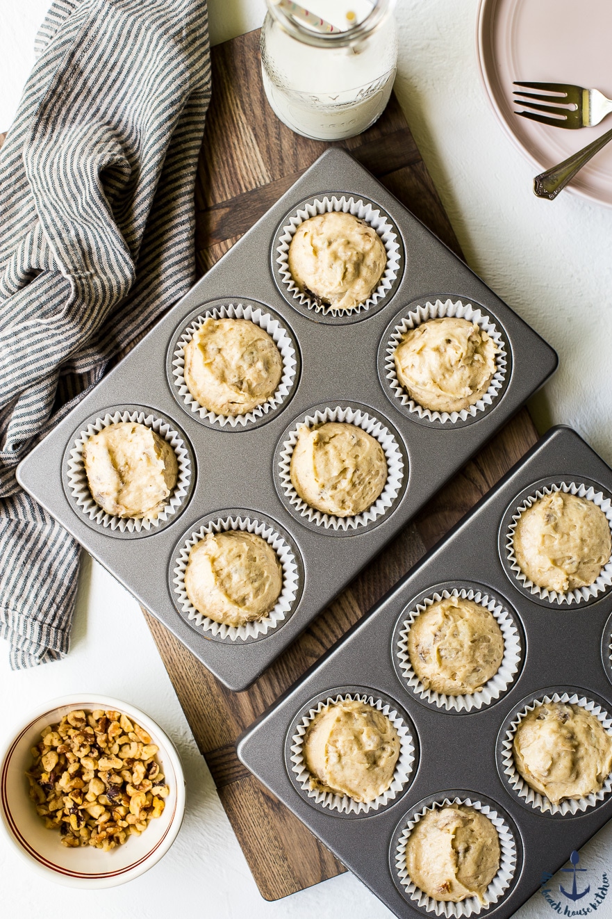 Overhead photo of prebaked banana cupcakes in muffin tins