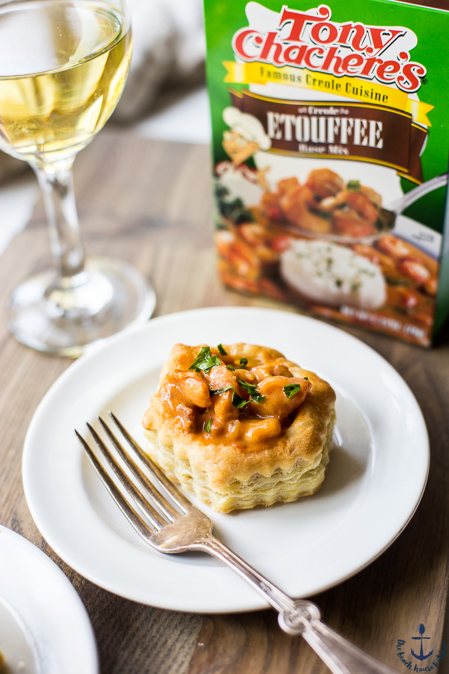 Photo of a shrimp etouffee vol au vent on a white plate with a fork