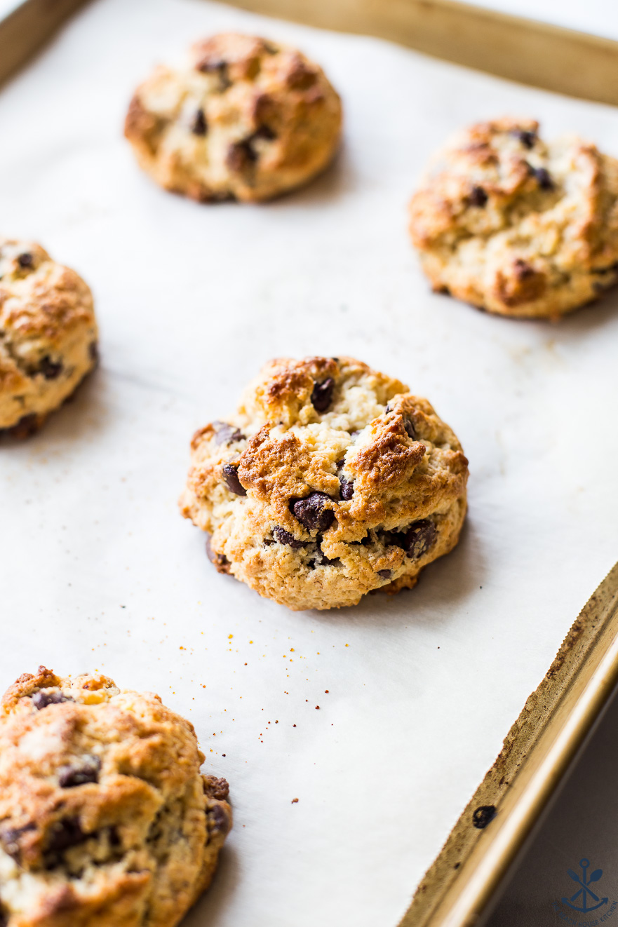 Chocolate chip toasted coconut scones on a baking sheet