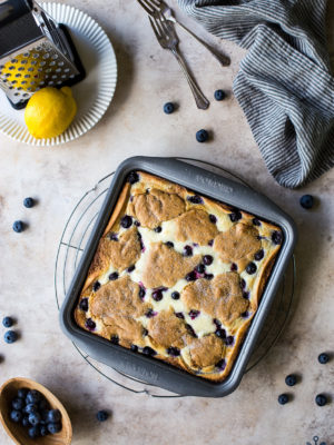 Overhead photo of lemon blueberry blondie cheesecake bars in 9x9 pan