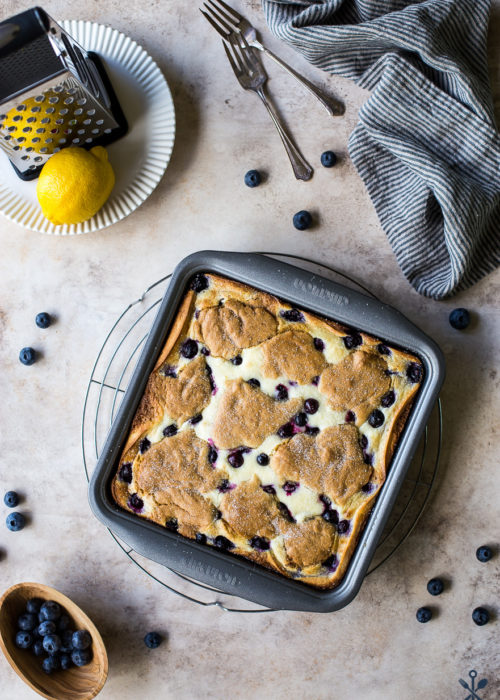 Overhead photo of lemon blueberry blondie cheesecake bars in 9x9 pan