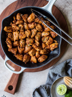 Overhead photo of skillet filled with Mexican spiced chicken bites
