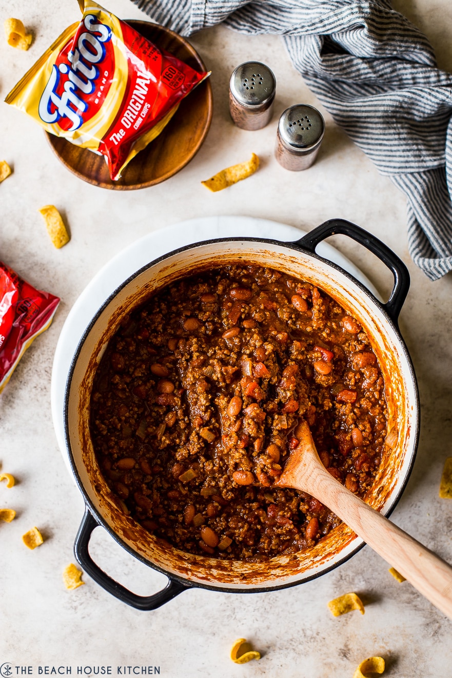Overhead photo of large Dutch oven filled with chili