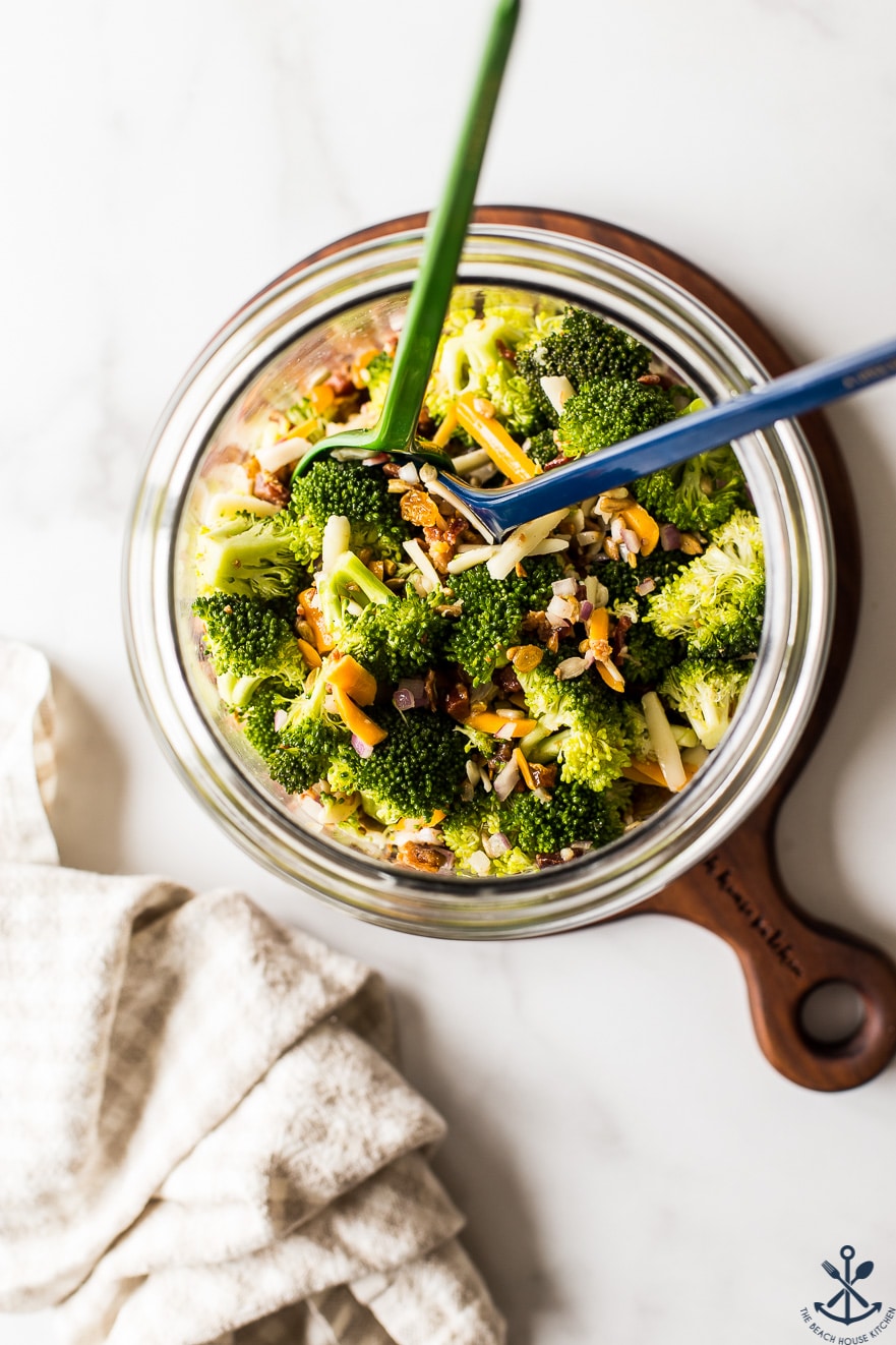 Overhead photo of classic broccoli salad with bacon in a glass jar