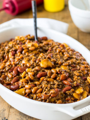 Baked Three Bean Casserole in a white oval dish