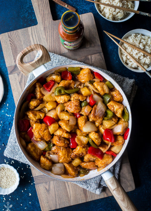 Overhead photo of Sweet and Sour Chicken in a white skillet