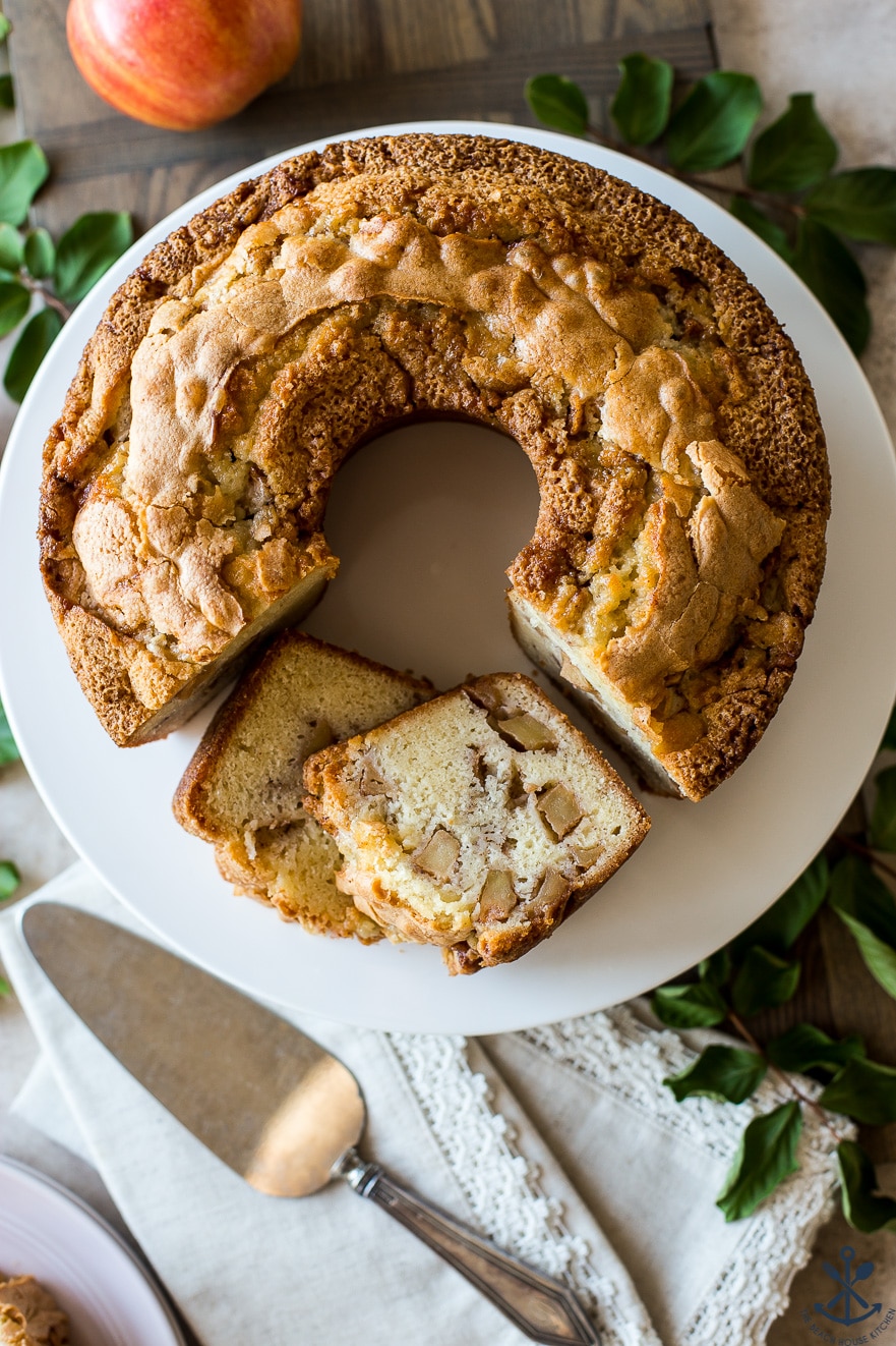 Extra delicious overhead photo of Jewish apple cake on a plate with two separate slices ready for serving