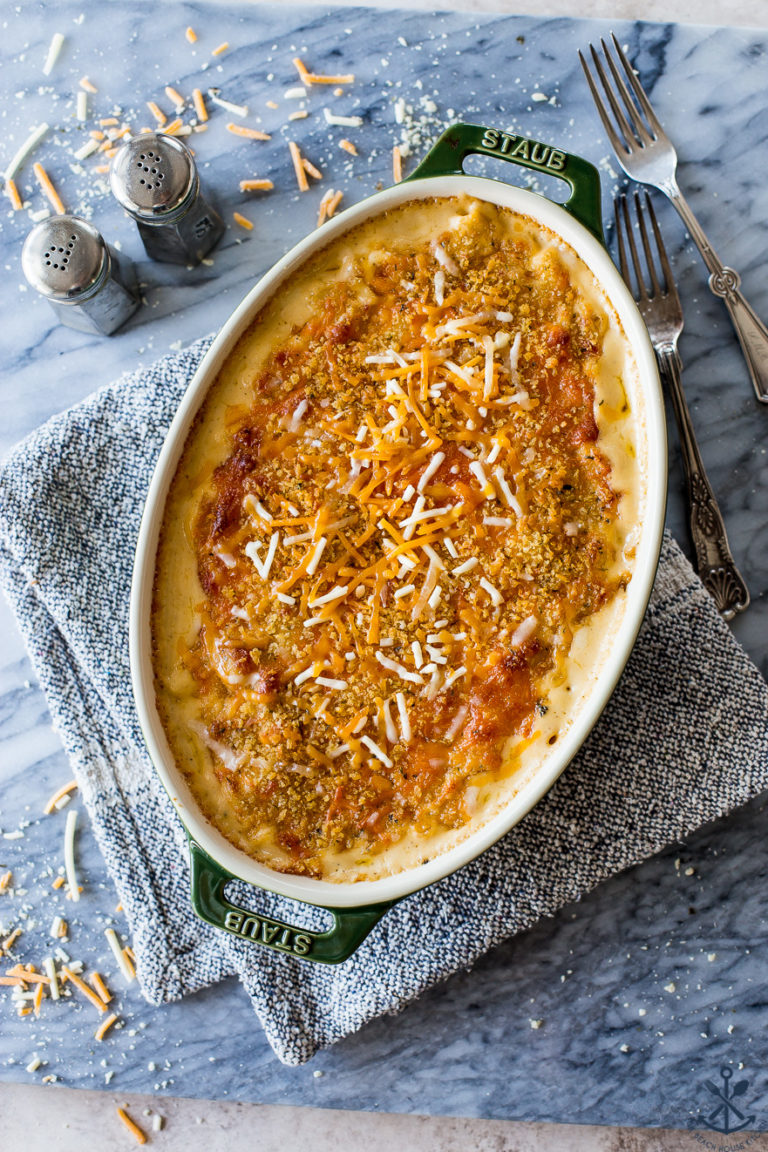 Overhead photo of Crazy Good Mac n' Cheese in an oval dish on a marble board