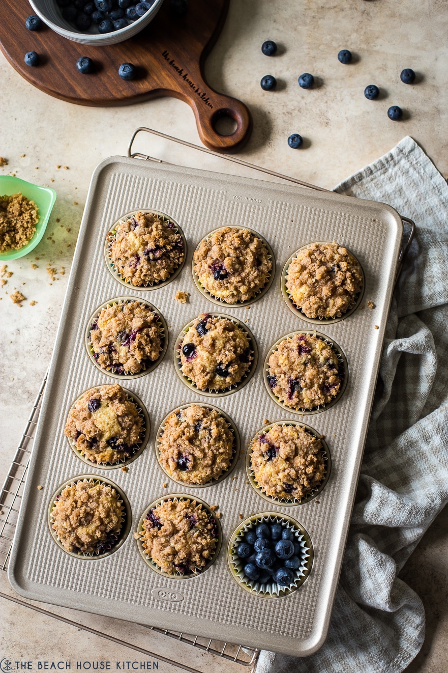 Overhead photo of Bakery Style Blueberry Muffins in a muffin pan looking amazing