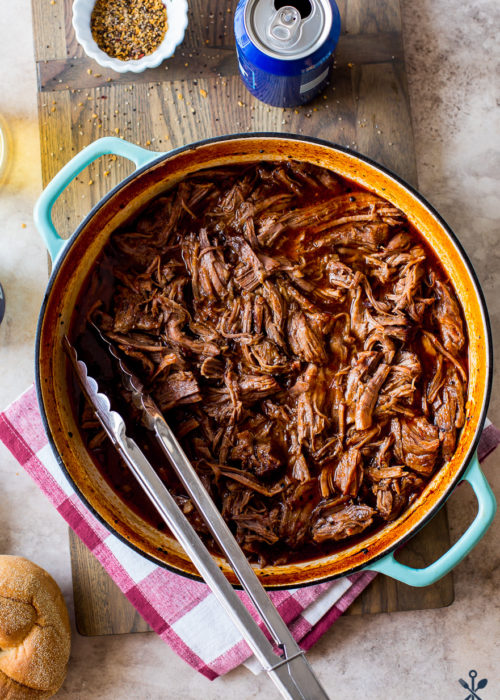 Overhead photo Beer-Braised BBQ Chuck Roast in a Dutch oven