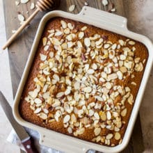 Pverhead photo of Easy Spiced Honey Snack Cake in a square baking dish