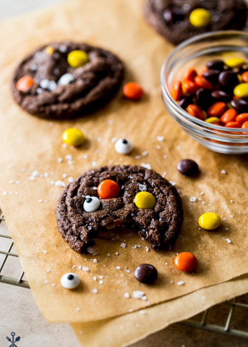 A chocolate cookie studded with Reese's pieces
