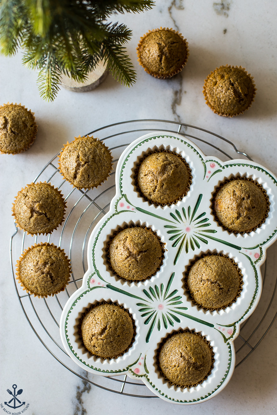 Overhead photo of chai cupcakes without frosting in a decorative muffin baking dish