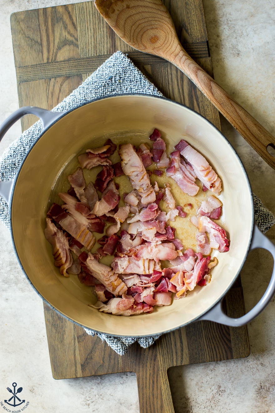 Overhead photo of a pot of pre-cooked chopped bacon