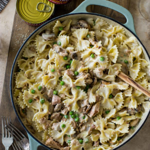 Overhead photo of a skillet of pasta with peas mushrooms and tuna