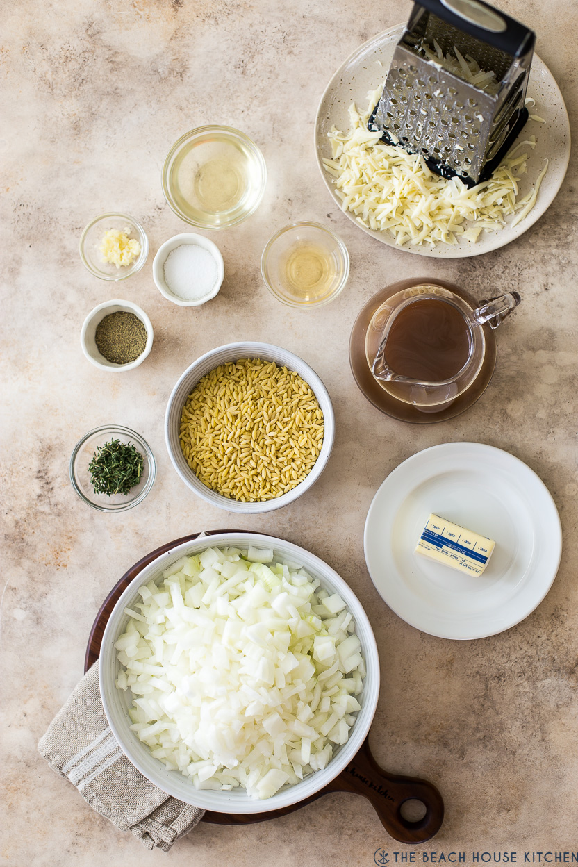 Overhead photo of ingredients in bowls for French onion pasta