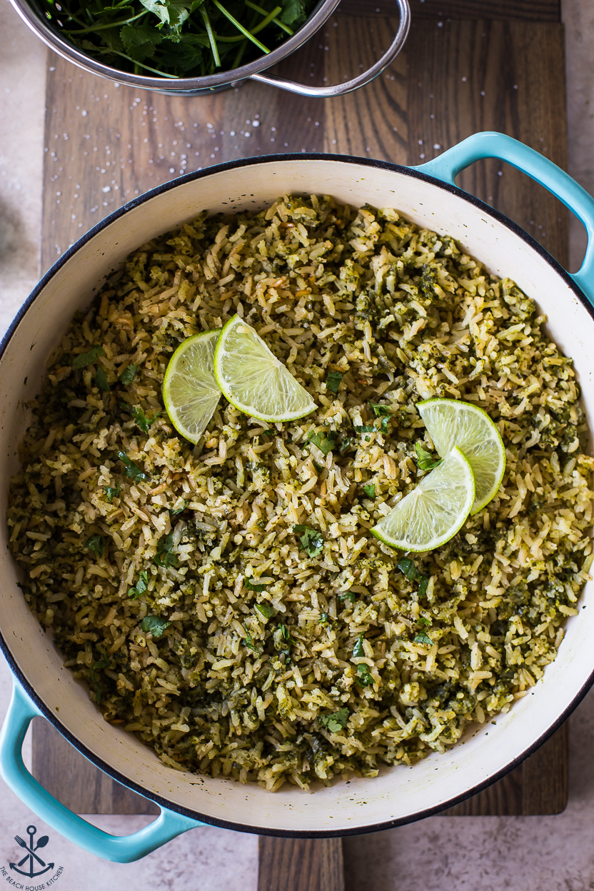 Up close overhead photo of a skillet of Arroz Verde (Mexican Green Rice)