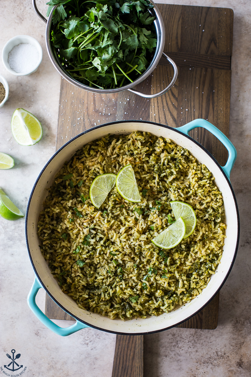 Overhead photo of a skillet filled with arroz verde (Mexican green rice)