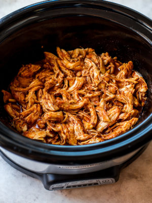 Shredded Honey Chipotle Chicken in a slow cooker