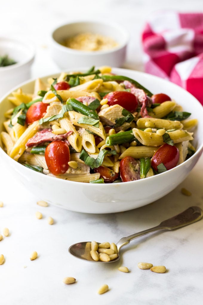 A bowl of chicken pesto pasta salad