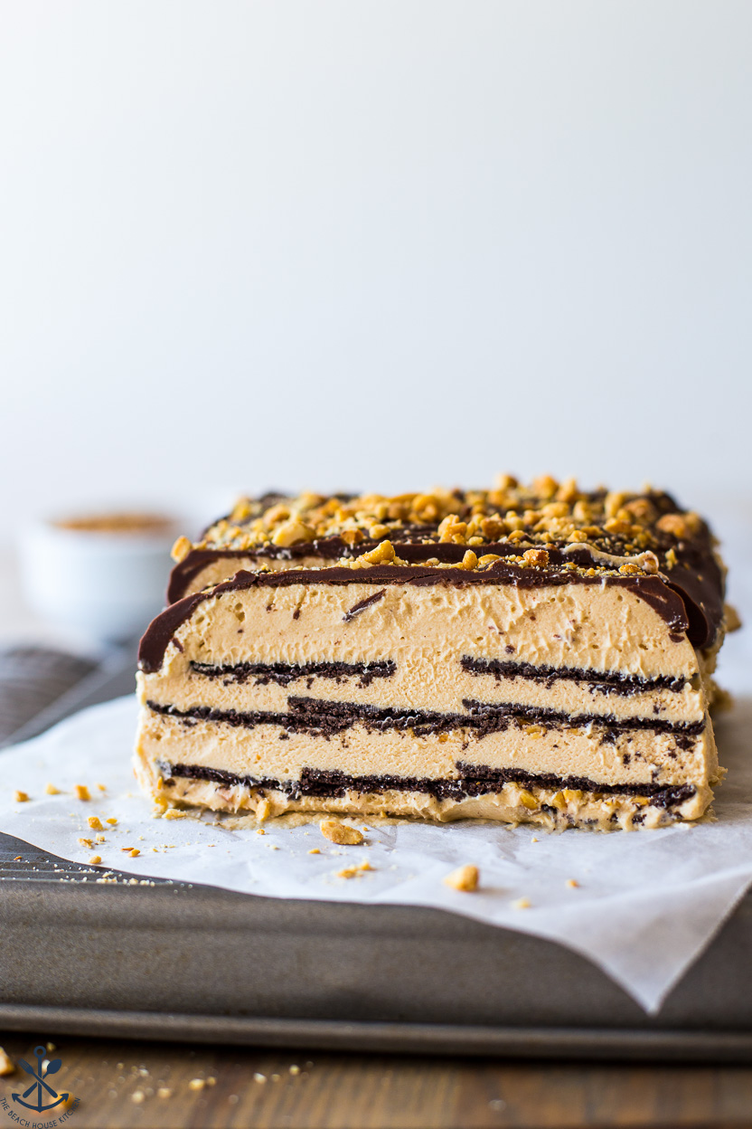 Up close photo of a peanut butter chocolate wafer cookie ice box cake