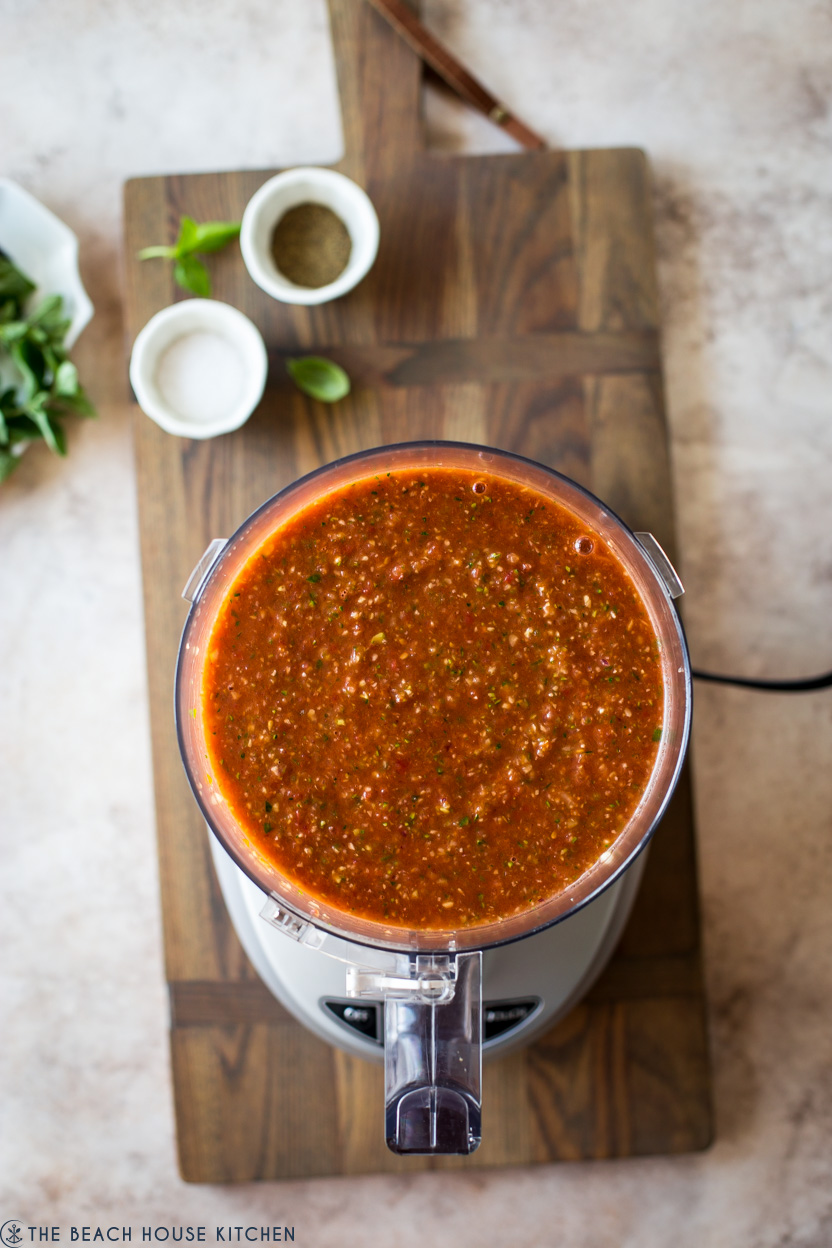 A food processor filled with gazpacho