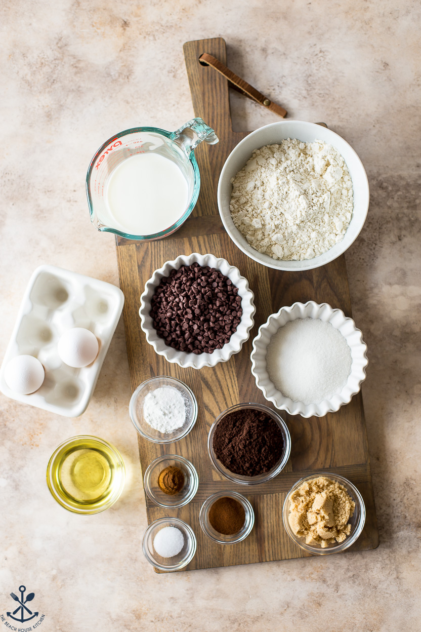 Overhead photo of ingredients for chocolate espresso muffins on a wooden board