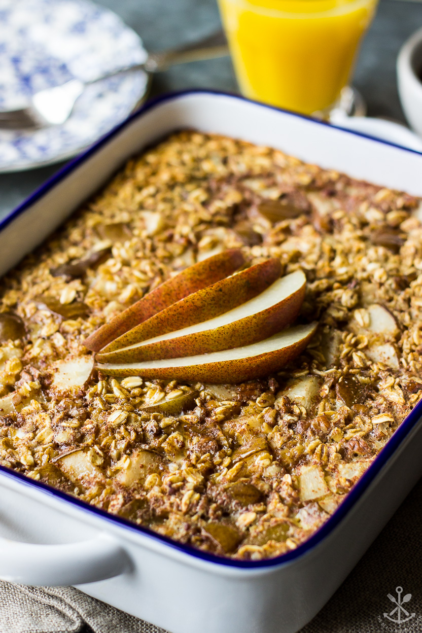 Up close photo of a baked oatmeal topped with pear slices