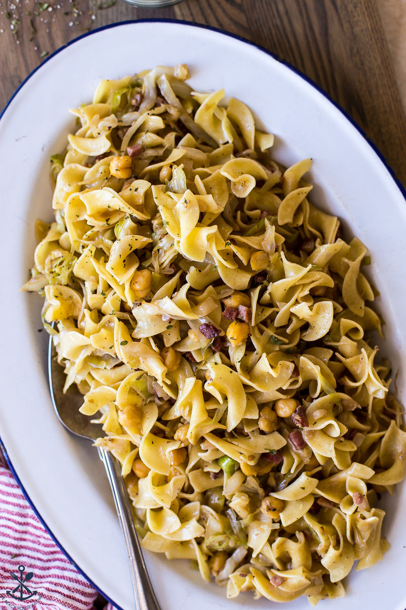 Up close overhead photo of a pasta dish with chickpeas and cabbage