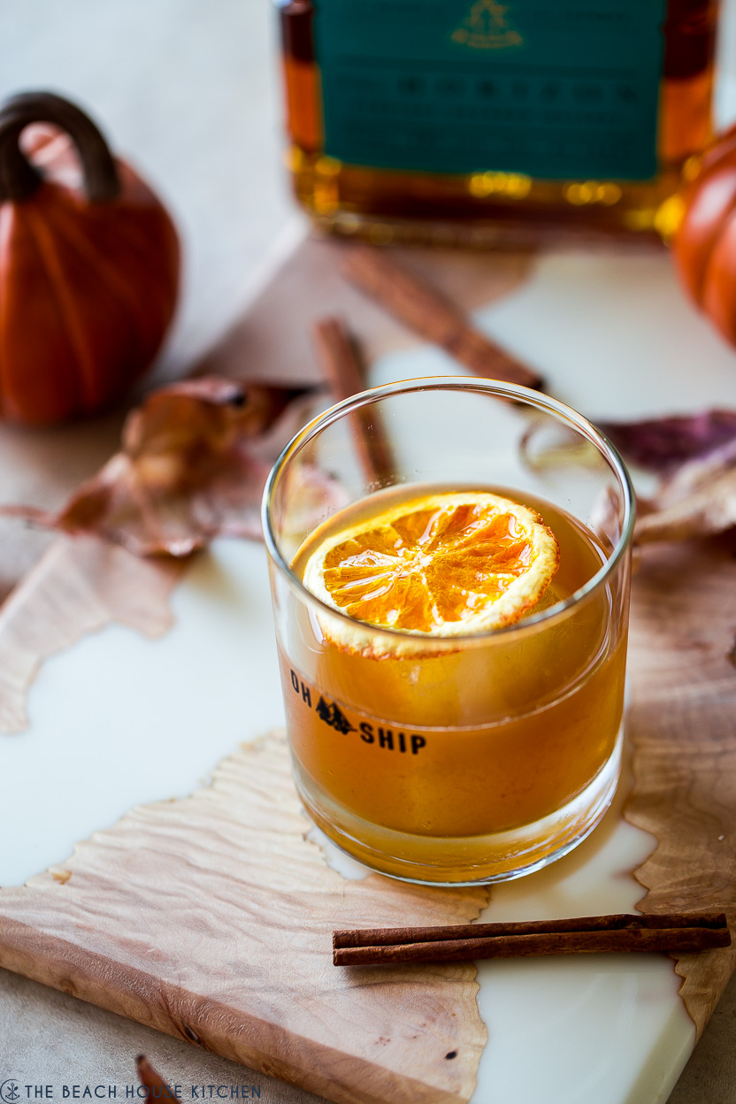 Up close photo of a pumpkin spice old fashioned cocktail