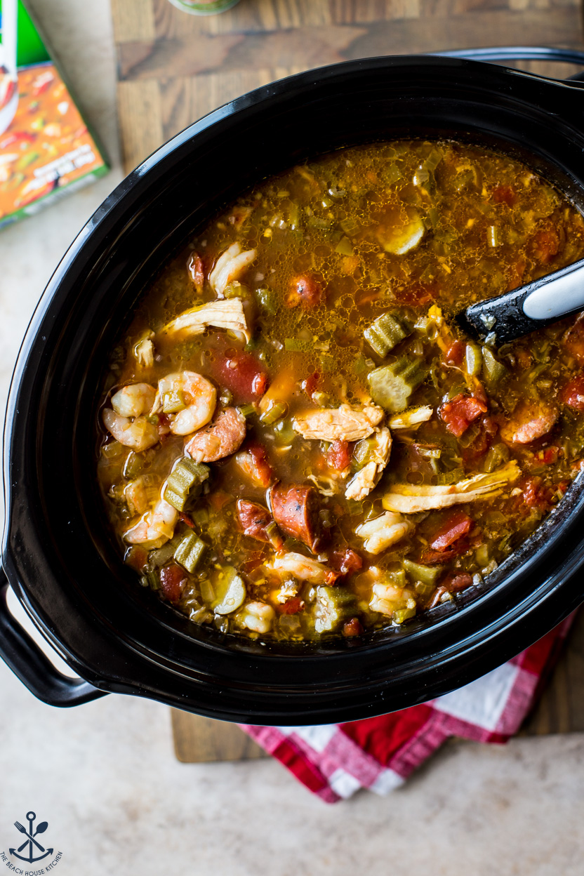 Overhead photo of a slow cooker filled with gumbo