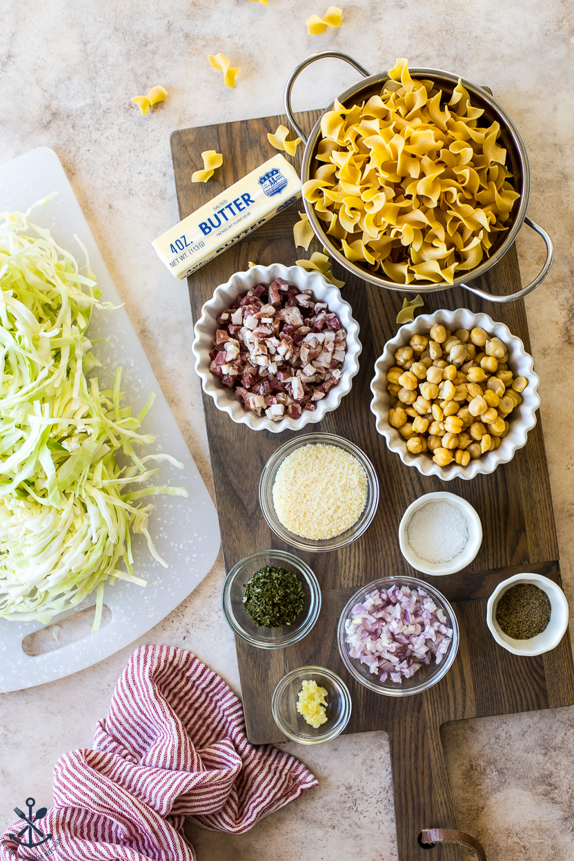 Overhead photo of ingredients for a pasta and cabbage dish