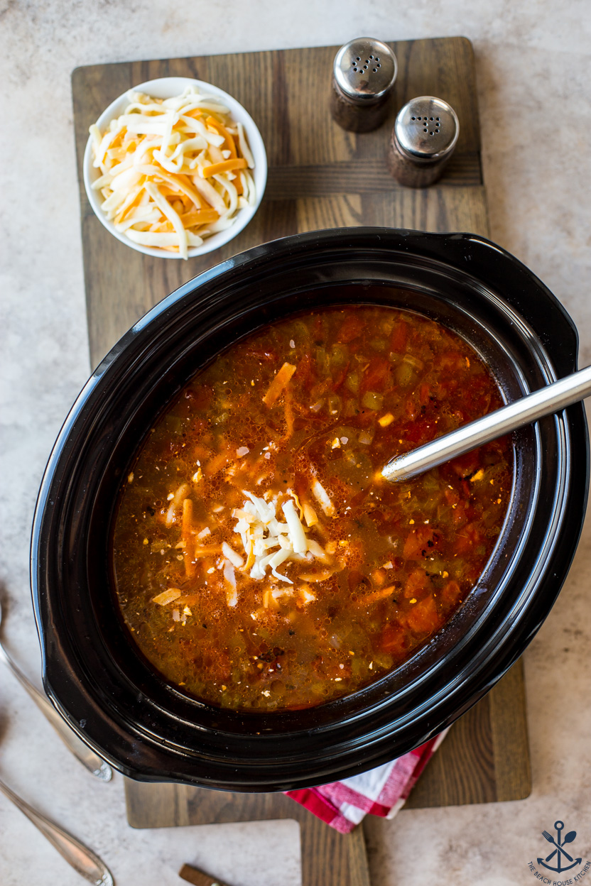 Overhead photo of a slow cooker of beef enchilada soup