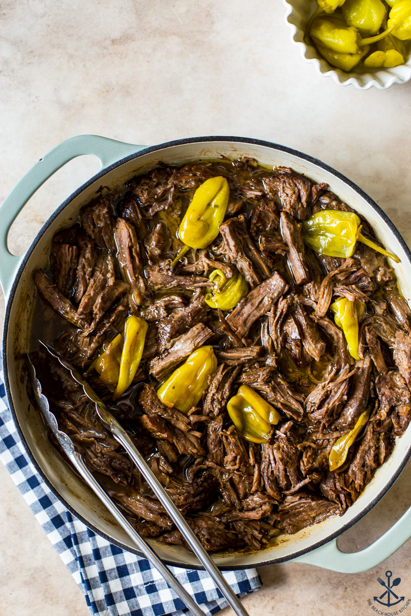 Up close overhead photo of a Mississippi pot roast with yellow peppers