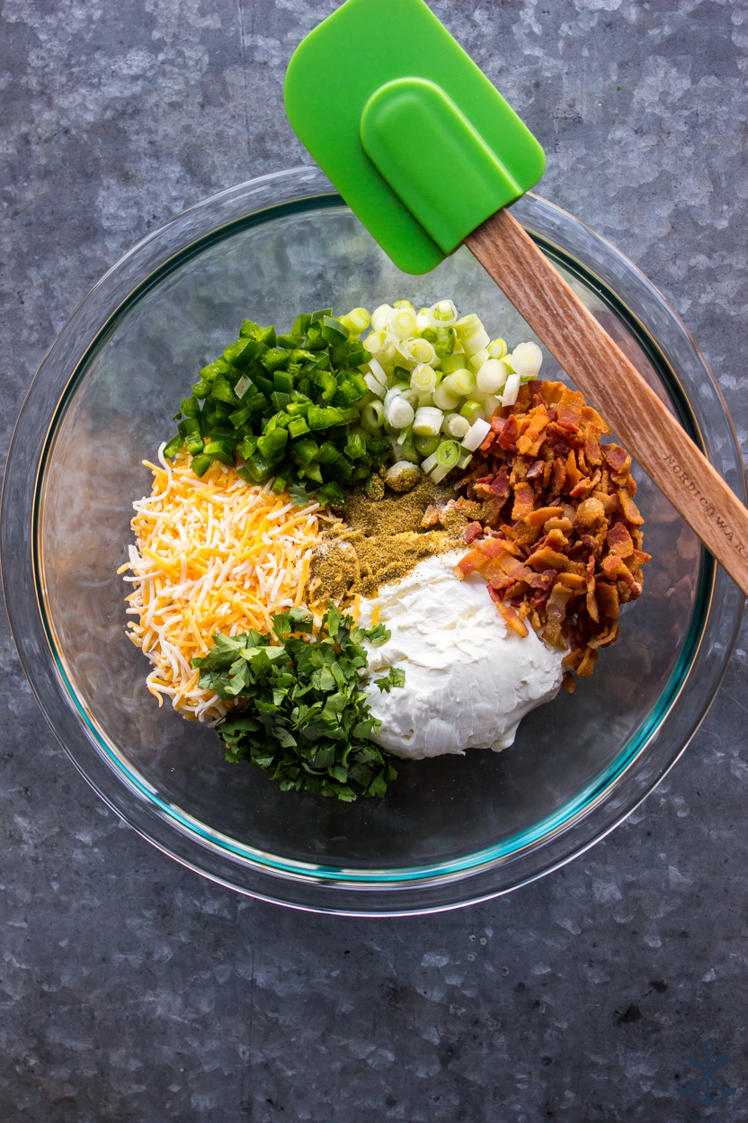 Overhead photo of a bowl filled with taquito filling ingredients