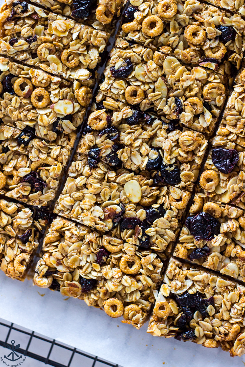 Overhead photo of sliced granola bars with almonds and blueberries