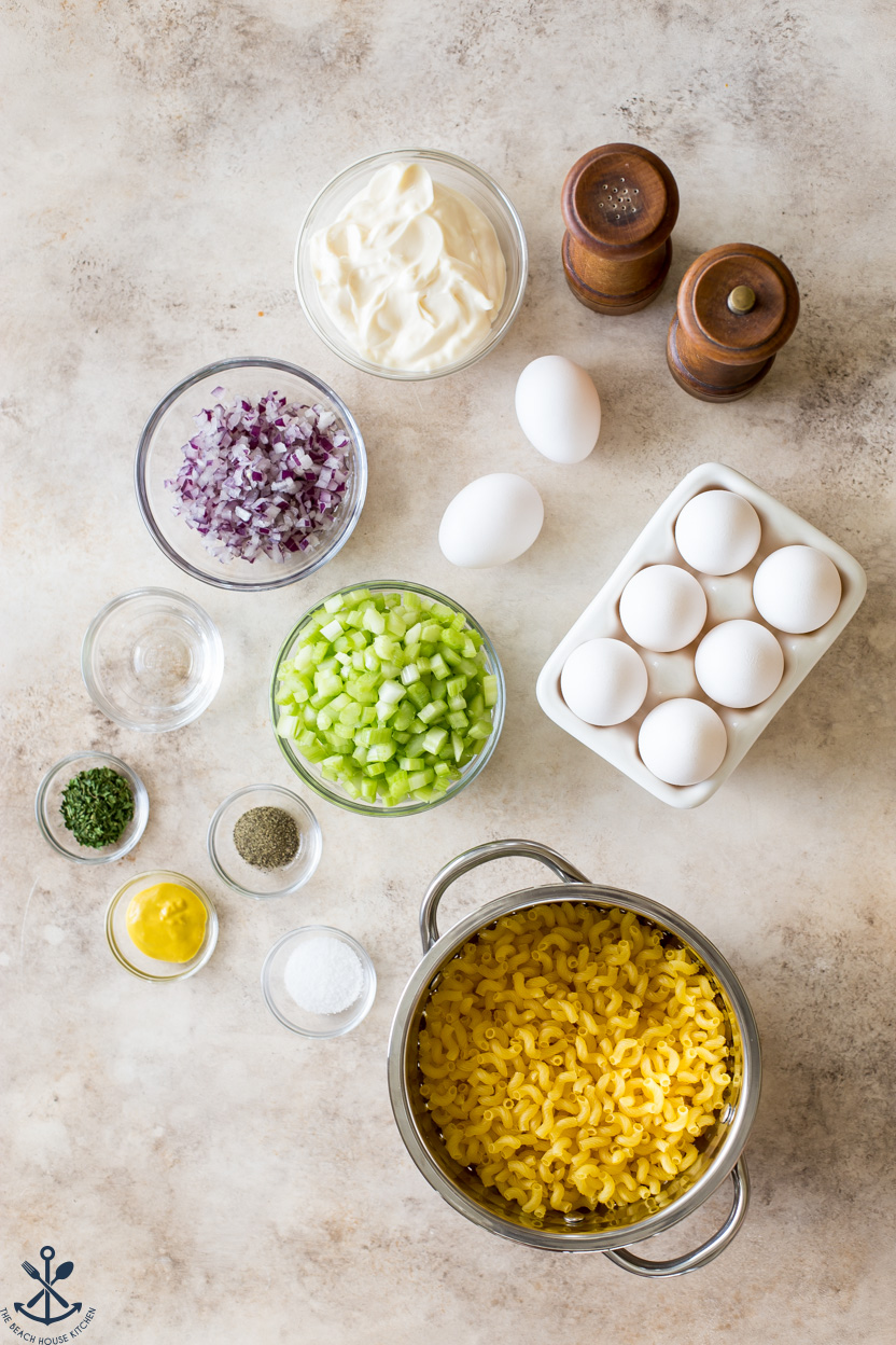 Overhead photo of ingredients for macaroni salad in bowls