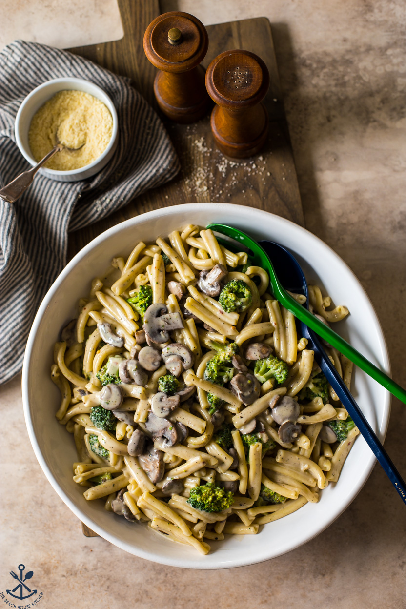 Overhead photo of a platter of Creamy Garlic Broccoli Mushroom Pasta