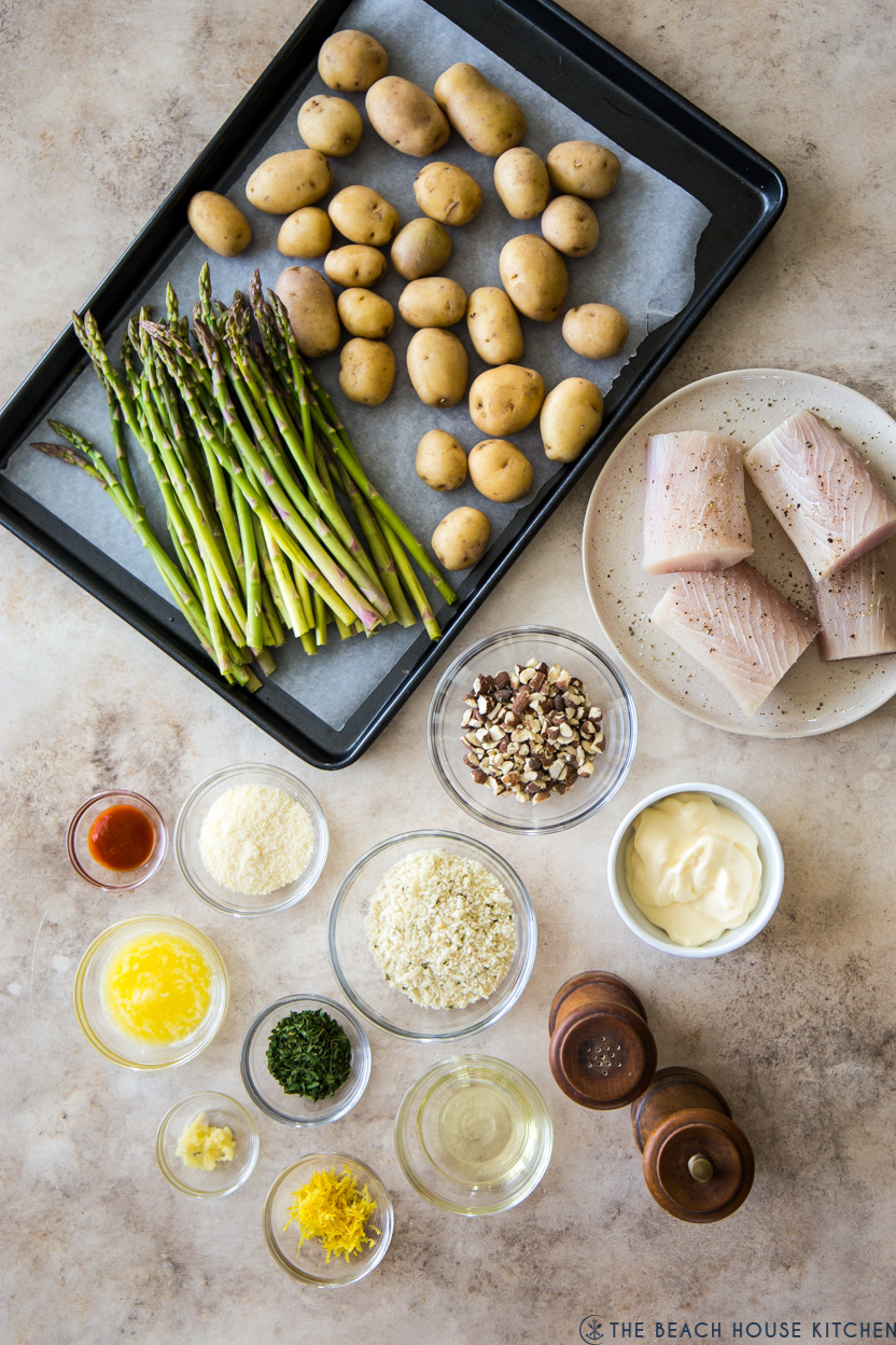 Overhead photo of ingredients for mahi mahi sheet pan meal with asparagus and potatoes