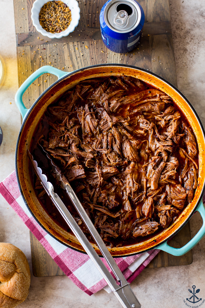 Overhead photo of Beer-Braised BBQ Chuck Roast in a skillet