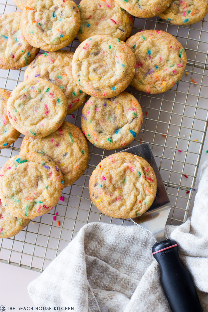 Overhead photo of funfetti cookies on a wire rack